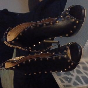 Black studded heels.